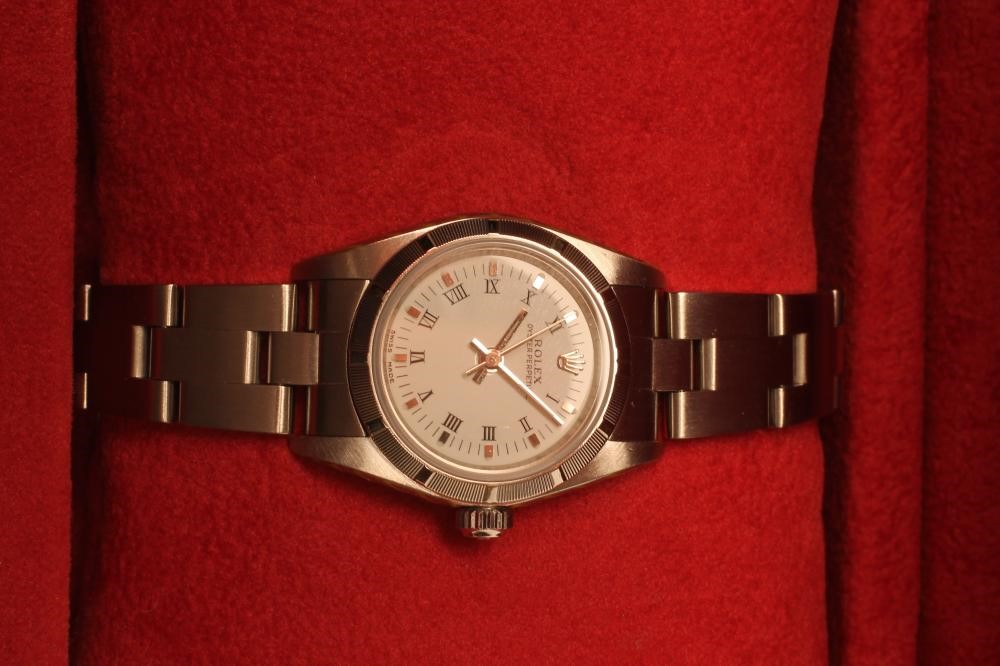 A LADY'S ROLEX OYSTER PERPETUAL PETITE STAINLESS WRISTWATCH Image