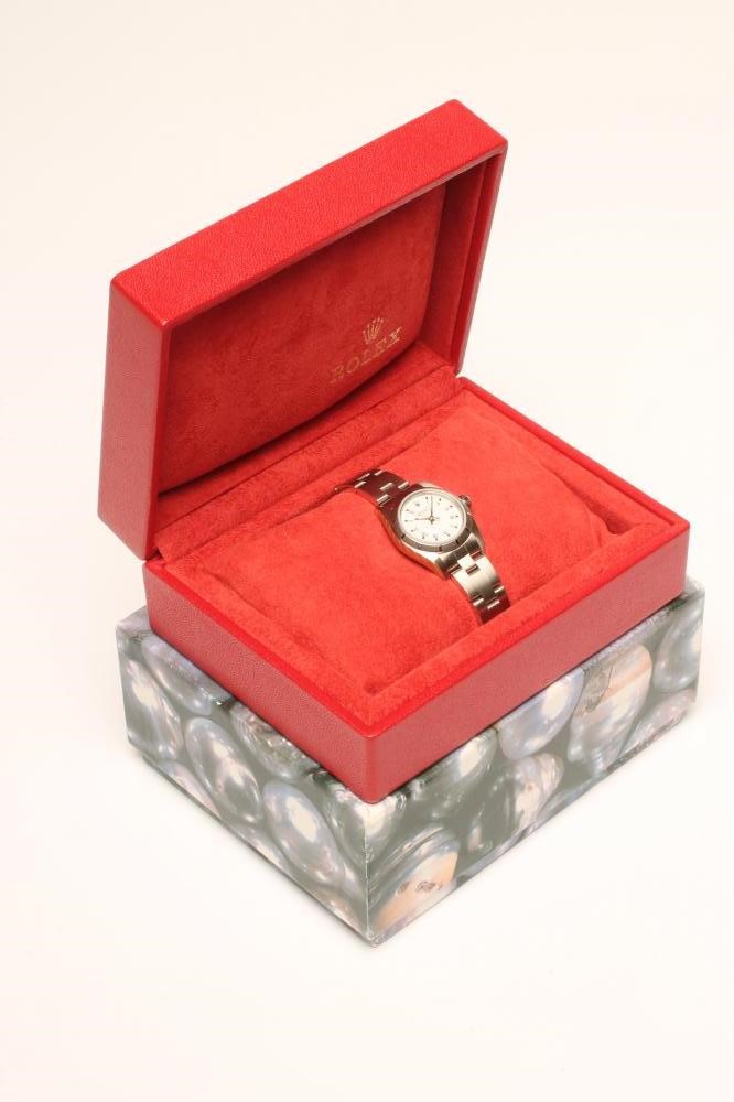 A LADY'S ROLEX OYSTER PERPETUAL PETITE STAINLESS WRISTWATCH Image