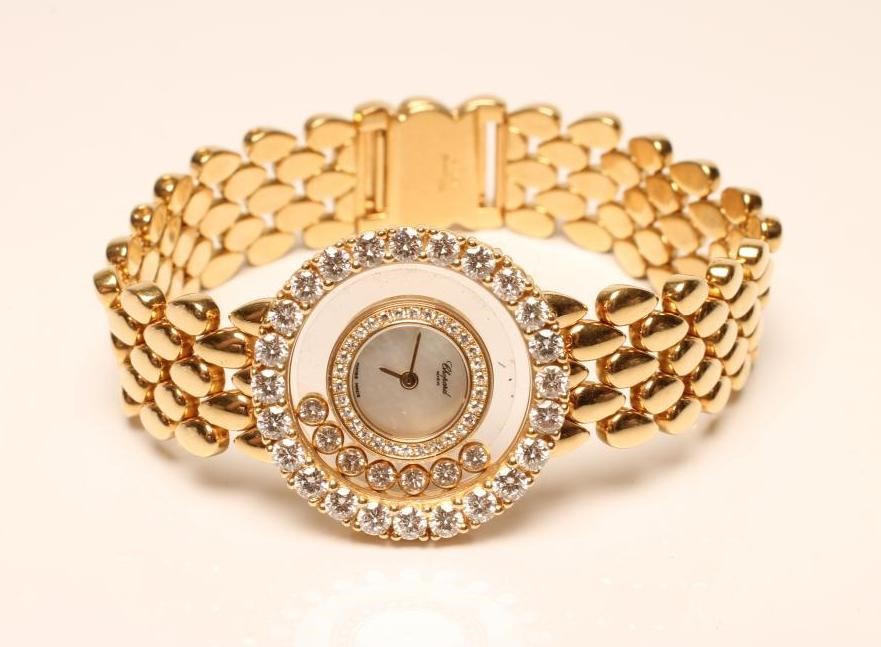 A LADY'S CHOPARD "HAPPY DIAMONDS" WRISTWATCH Image