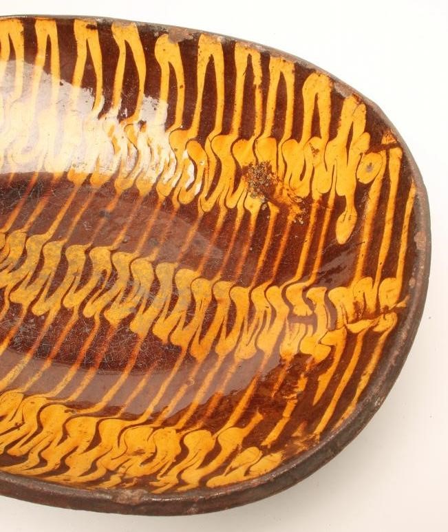 AN ENGLISH COUNTRY SLIPWARE DISH Image
