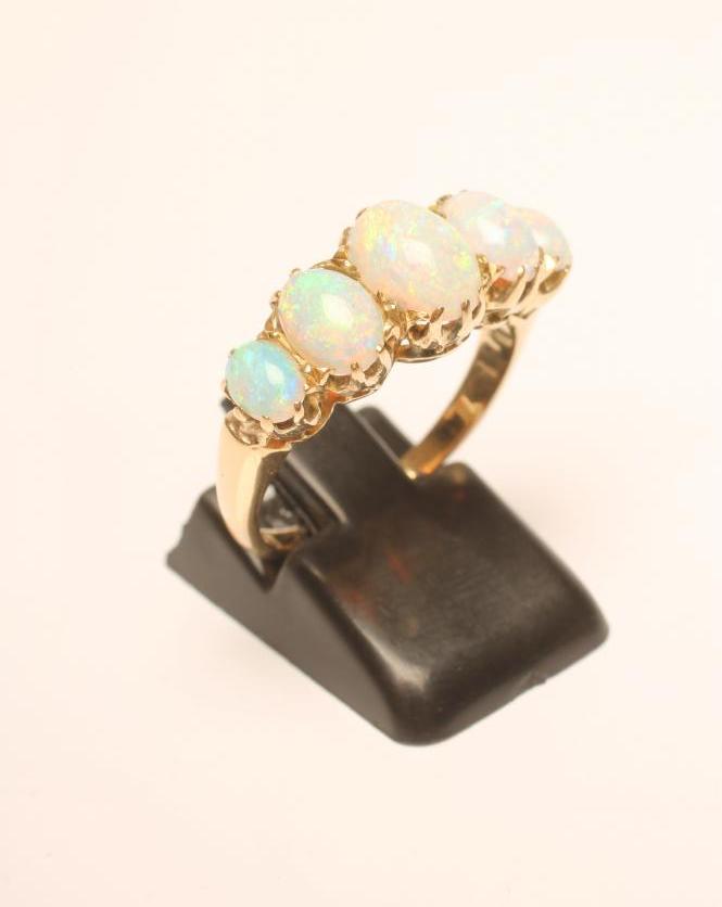 A FIVE STONE OPAL RING Image