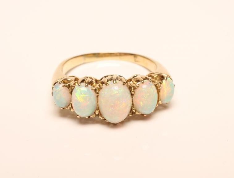 A FIVE STONE OPAL RING Image