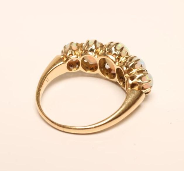 A FIVE STONE OPAL RING Image