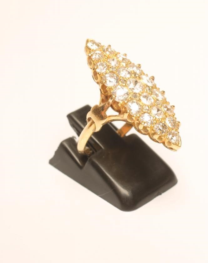 A DIAMOND MARQUISE PANEL RING Image