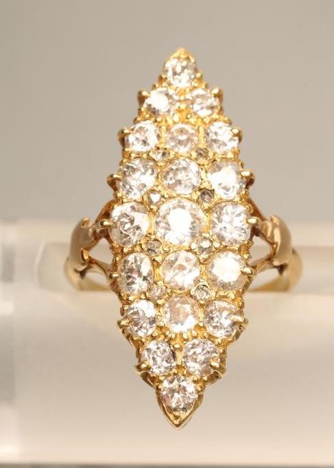 A DIAMOND MARQUISE PANEL RING Image