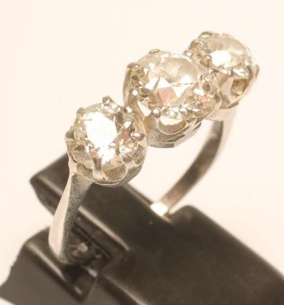 A THREE STONE DIAMOND RING Image