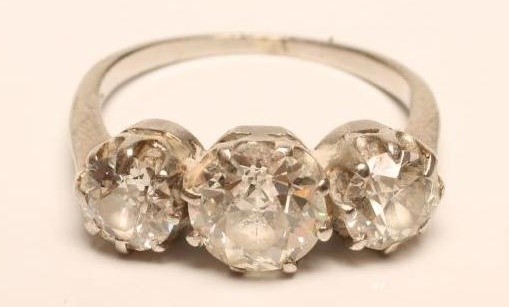 A THREE STONE DIAMOND RING Image
