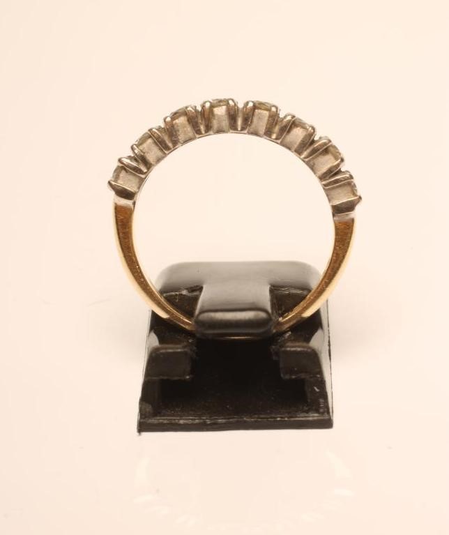 AN EIGHT STONE DIAMOND HALF HOOP ETERNITY RING Image