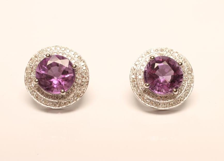 A PAIR OF AMETHYST AND DIAMOND EAR STUDS Image