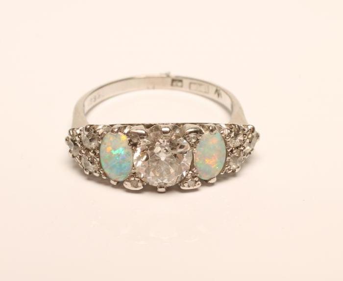 A DIAMOND AND OPAL RING Image