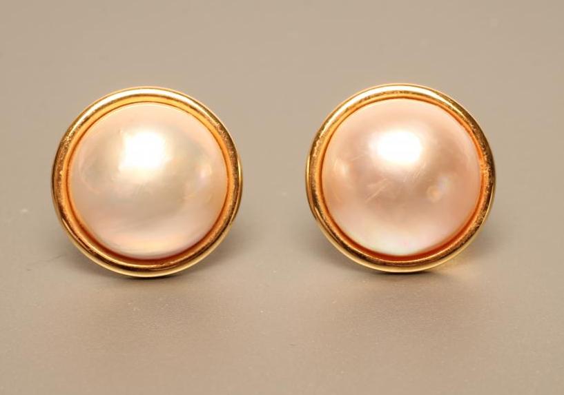 A PAIR OF MABE PEARL EAR STUDS in plain unmarked mounts with cupped butterflies (Est. plus 21% Image
