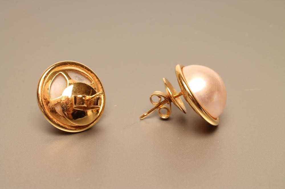 A PAIR OF MABE PEARL EAR STUDS in plain unmarked mounts with cupped butterflies (Est. plus 21% Image