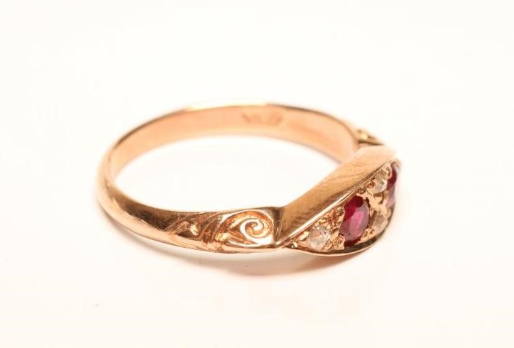 A VICTORIAN STYLE RUBY AND DIAMOND RING Image