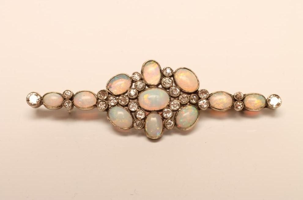 AN EDWARDIAN OPAL AND DIAMOND BROOCH Image
