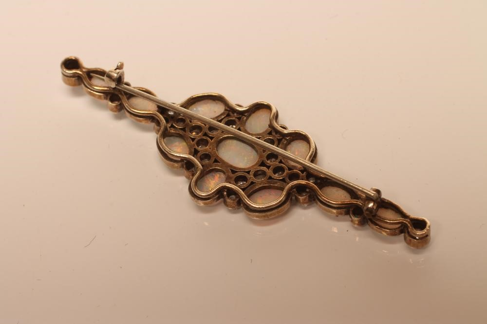 AN EDWARDIAN OPAL AND DIAMOND BROOCH Image