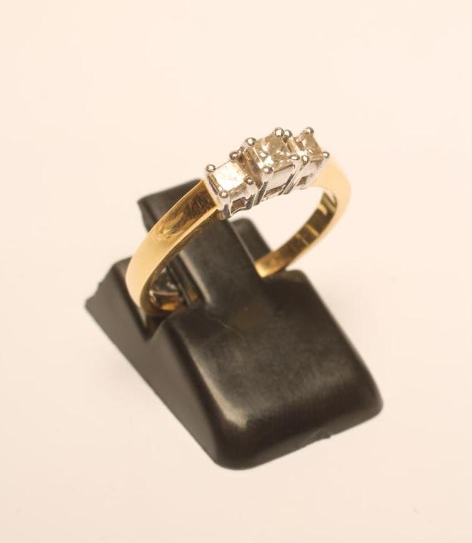 A THREE STONE DIAMOND RING Image