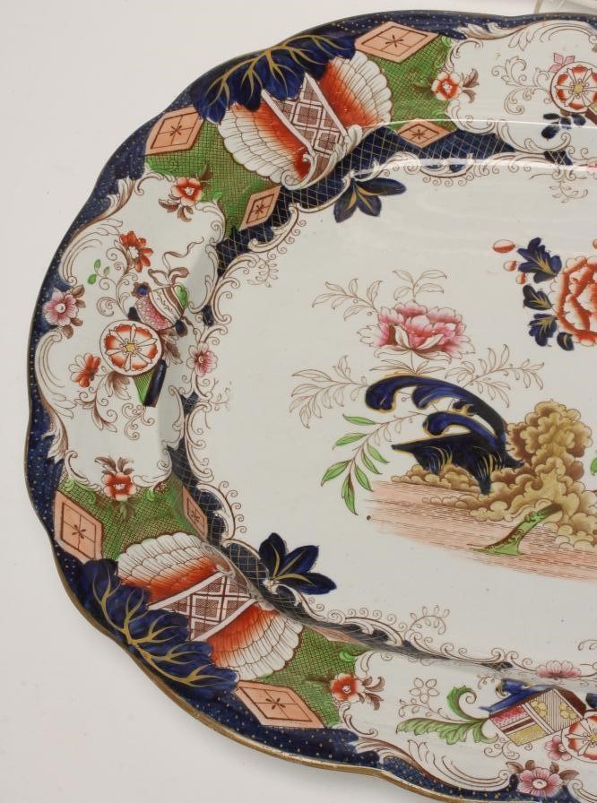 AN EARLY VICTORIAN DAVENPORT STONE CHINA MEAT PLATE of shaped oblong form Image