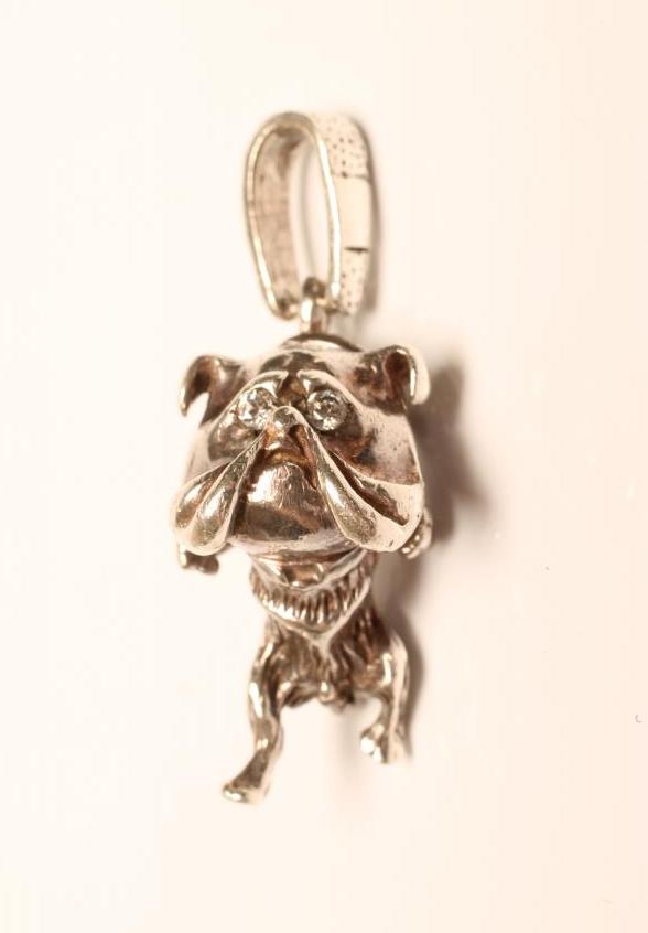A MODERN CAST SILVER NOVELTY BULLDOG PENDANT with diamond set eyes and collar and with engraved bale Image