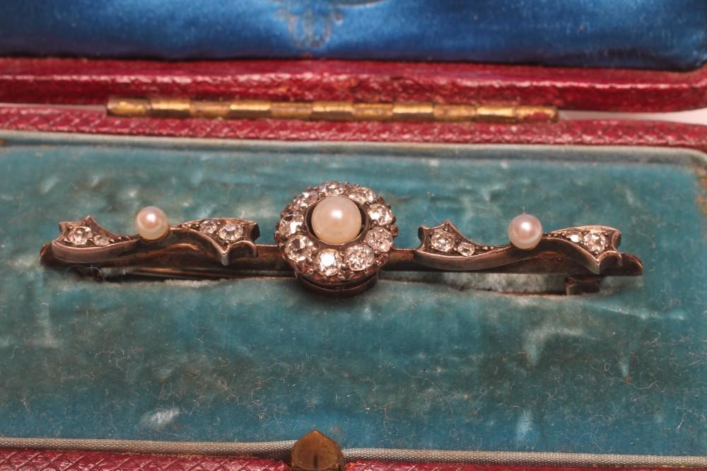 A LATE VICTORIAN PEARL AND DIAMOND BAR BROOCH Image