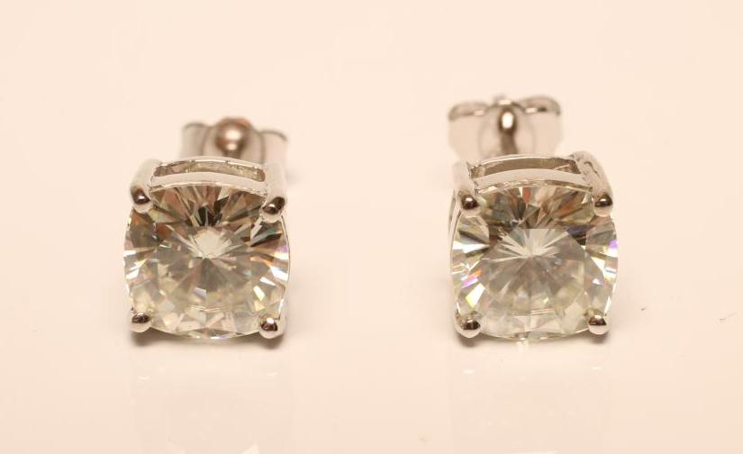 A PAIR OF EAR STUDS Image