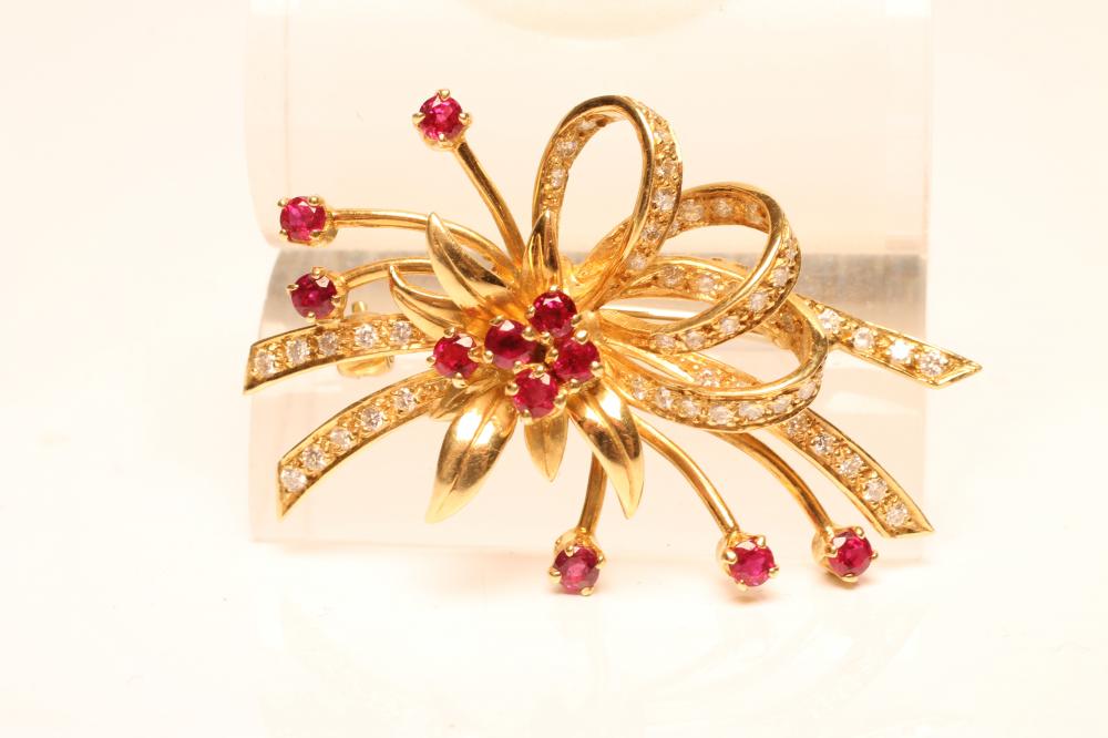 A RUBY AND DIAMOND SPRAY BROOCH by Cropp & Farr Image