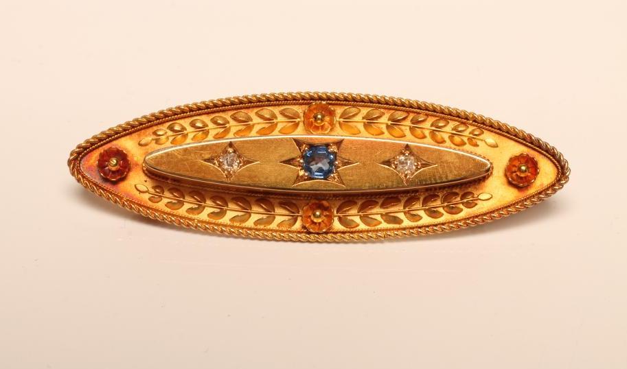 A LATE VICTORIAN 15CT GOLD BROOCH Image