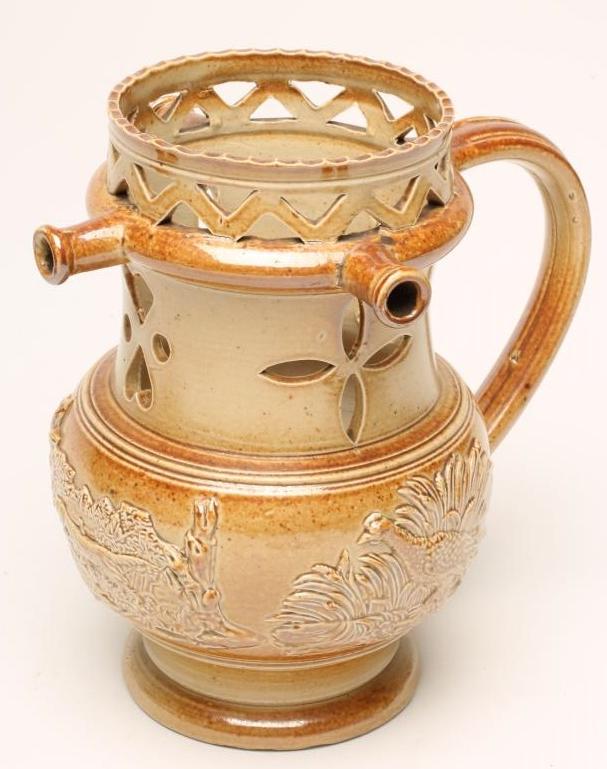 A SALTGLAZE STONEWARE PUZZLE JUG Image