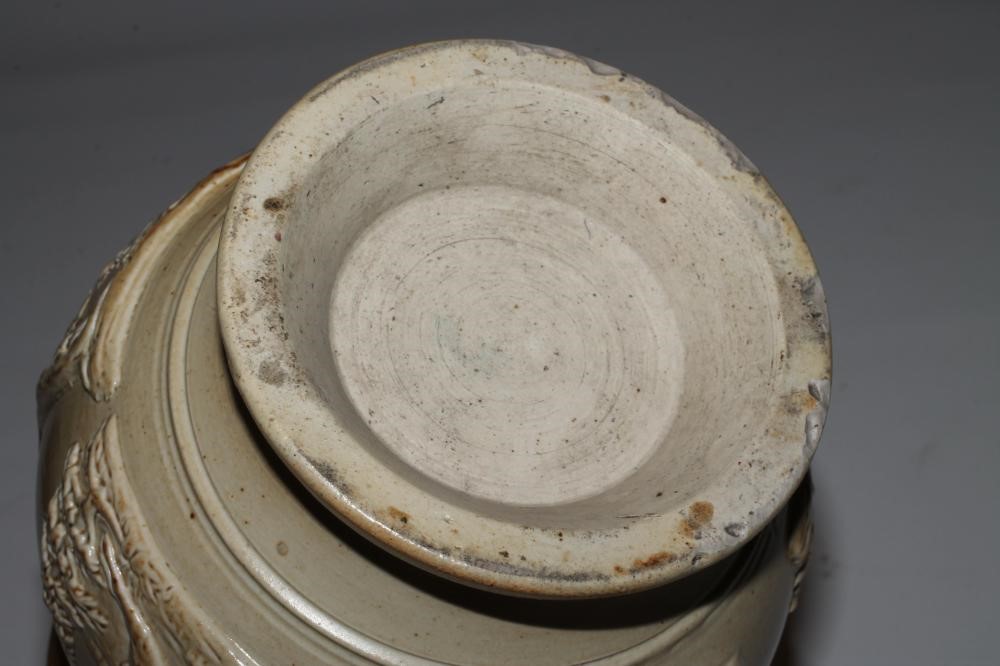 A SALTGLAZE STONEWARE PUZZLE JUG Image