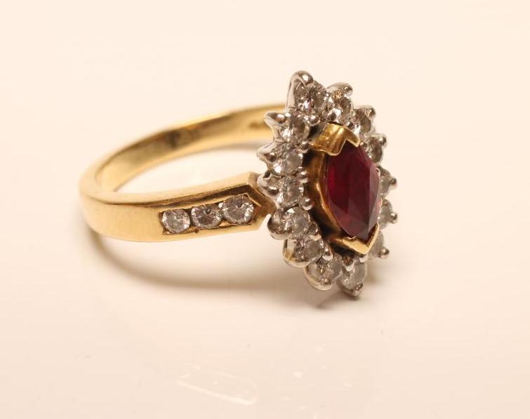 A RUBY AND DIAMOND CLUSTER RING Image
