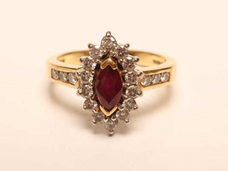 A RUBY AND DIAMOND CLUSTER RING Image