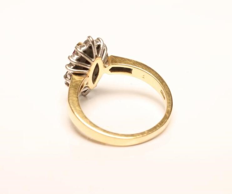 A RUBY AND DIAMOND CLUSTER RING Image