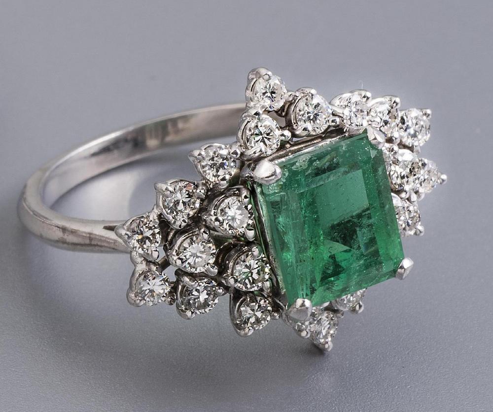 AN EMERALD AND DIAMOND RING Image