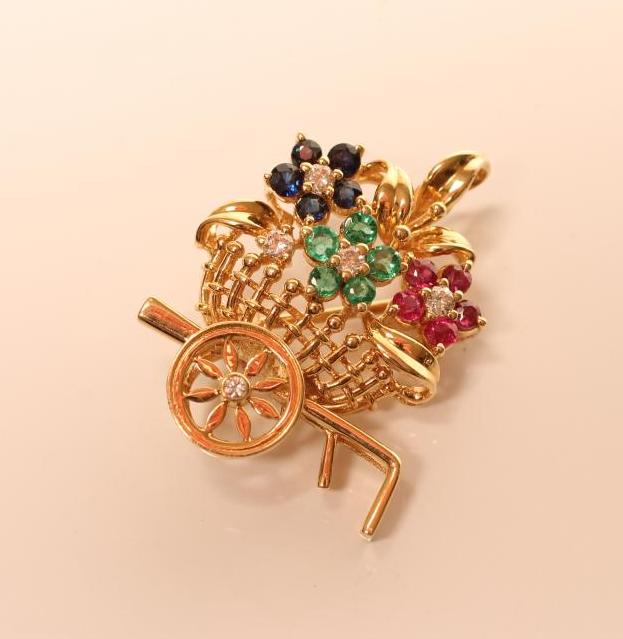 A NOVELTY BROOCH modelled as a flower stall with a sapphire Image