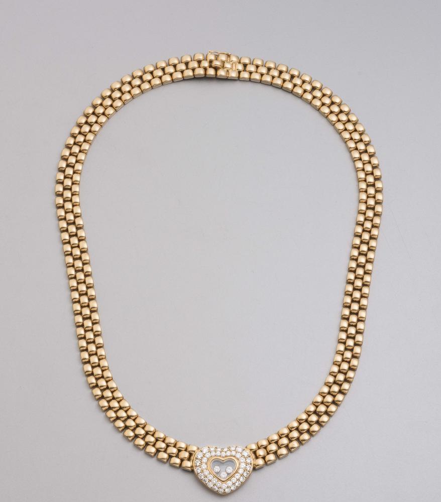A CHOPARD FLOATING DIAMOND PENDANT AND NECKLACE Image