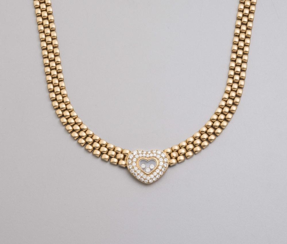 A CHOPARD FLOATING DIAMOND PENDANT AND NECKLACE Image