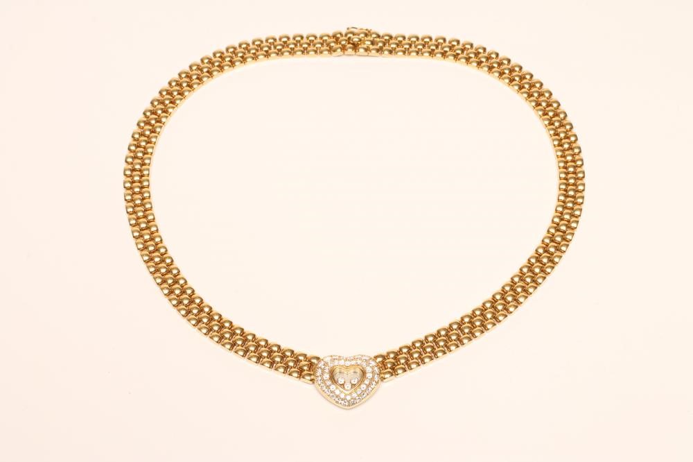 A CHOPARD FLOATING DIAMOND PENDANT AND NECKLACE Image