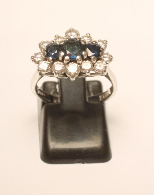 A SAPPHIRE AND DIAMOND DRESS RING Image