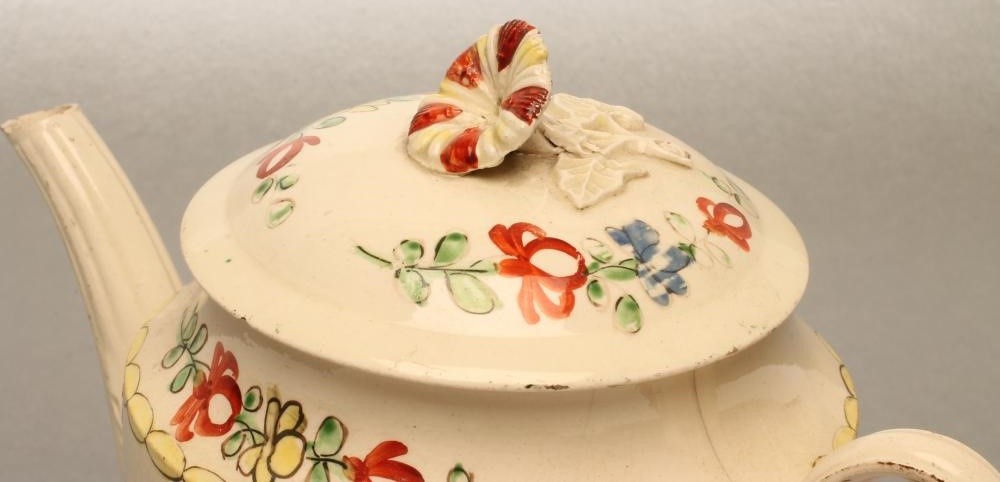 A CREAMWARE TEAPOT AND COVER Image