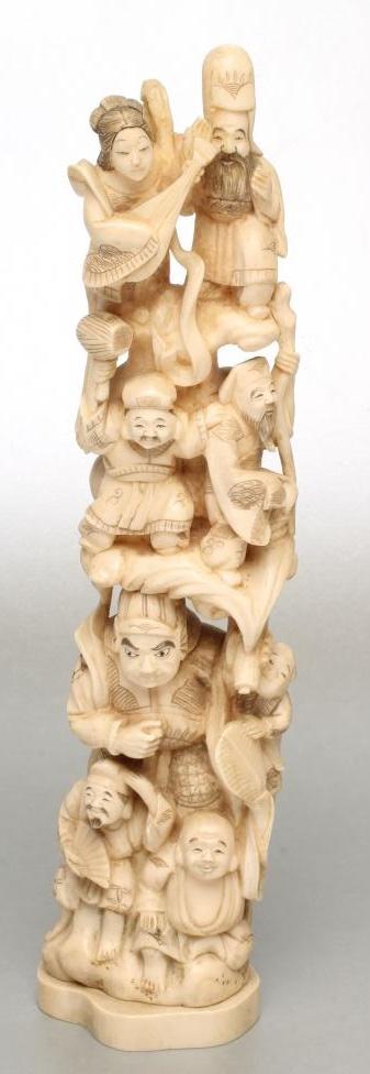 A JAPANESE ONE PIECE IVORY FIGURE GROUP Image