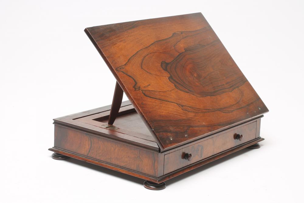 A ROSEWOOD READING/WRITING BOX Image