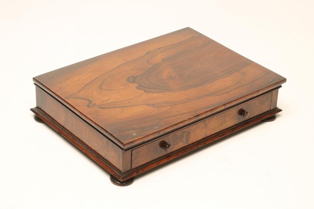 A ROSEWOOD READING/WRITING BOX Image