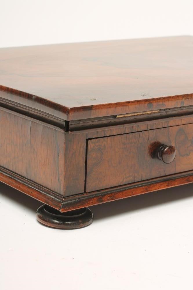 A ROSEWOOD READING/WRITING BOX Image