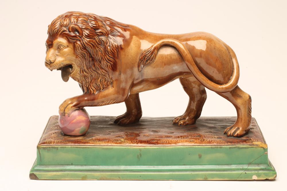 A CONTINENTAL MAJOLICA LION Image