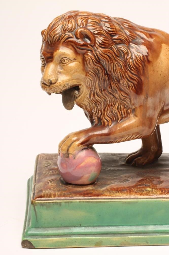 A CONTINENTAL MAJOLICA LION Image