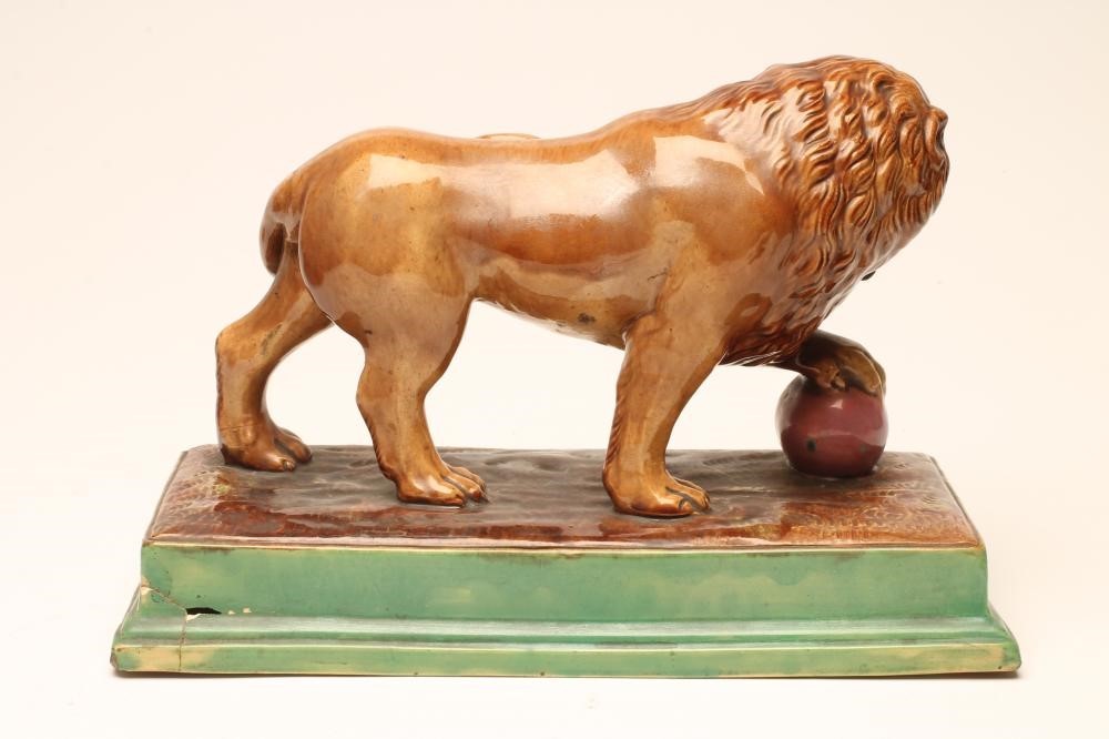 A CONTINENTAL MAJOLICA LION Image
