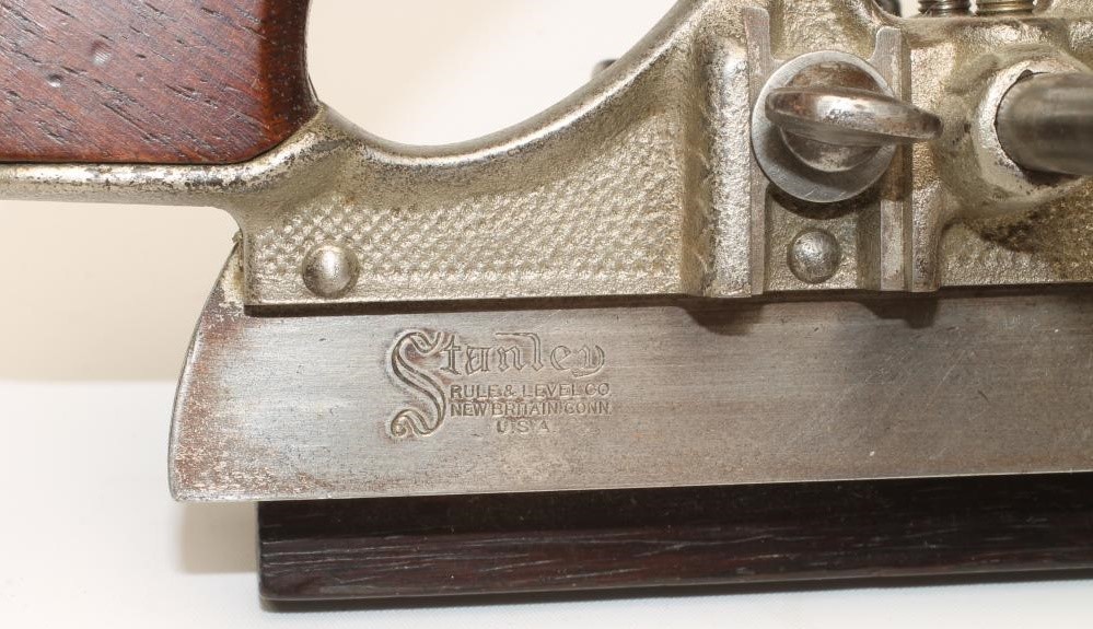 A STANLEY NO 45 PLOUGH PLANE with rosewood handle and knob Image