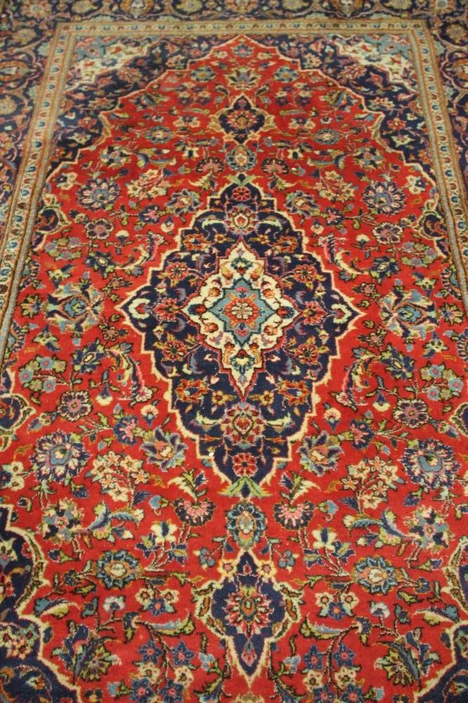 A PERSIAN STYLE RUG Image