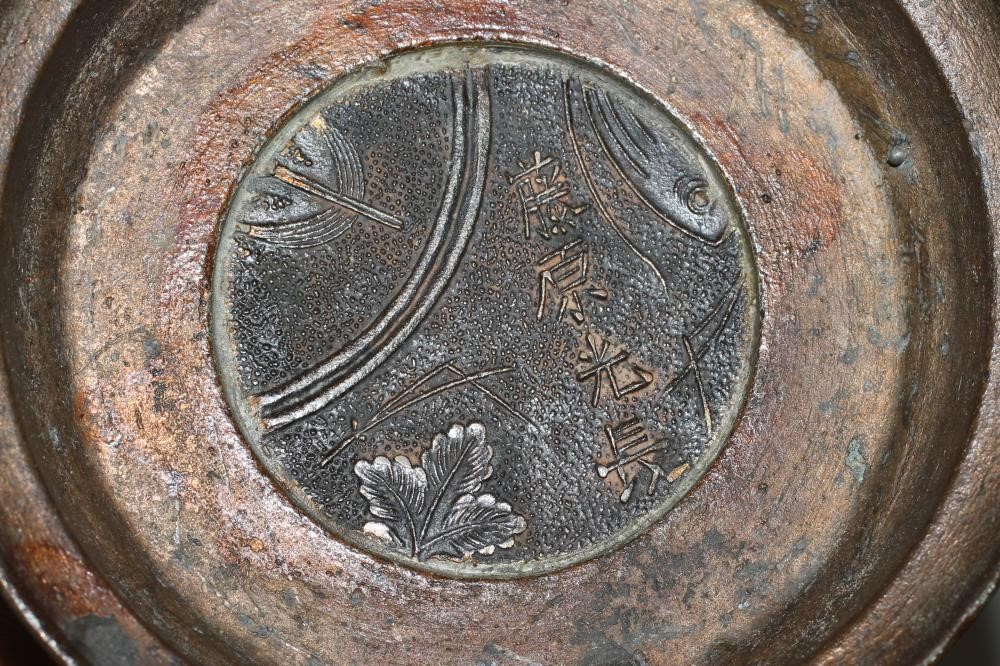 A PAIR OF CHINESE CAST METAL CANDLESTICKS Image