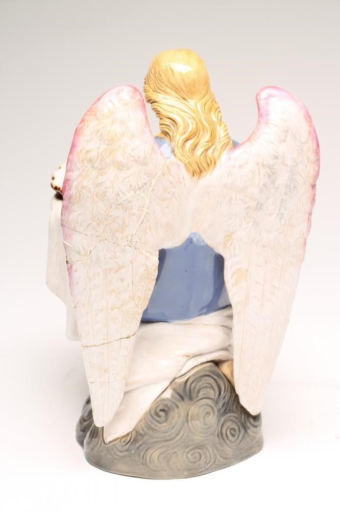 AN ITALIAN DELLA ROBBIA STYLE MAIOLICA ANGEL Image