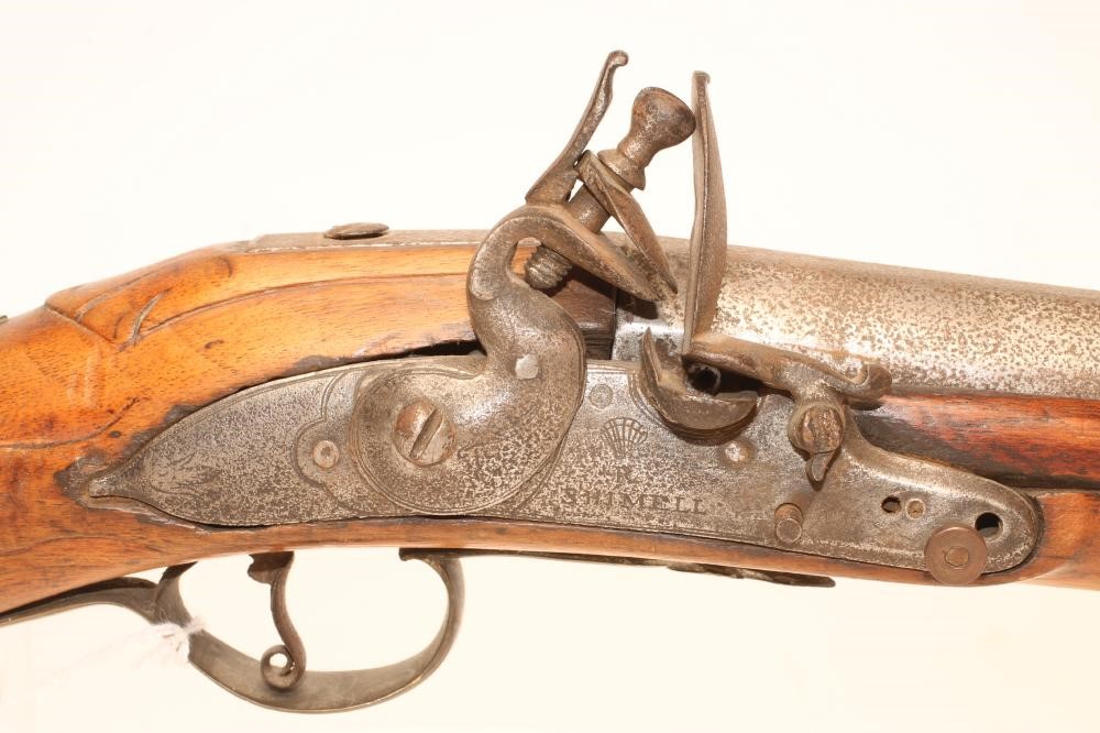 A LONG FLINTLOCK FOWLING GUN Image
